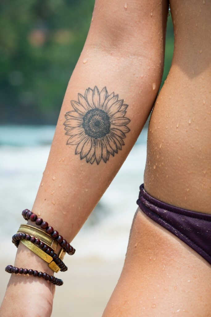 Sunflower tattoo for girls 2023 photo.