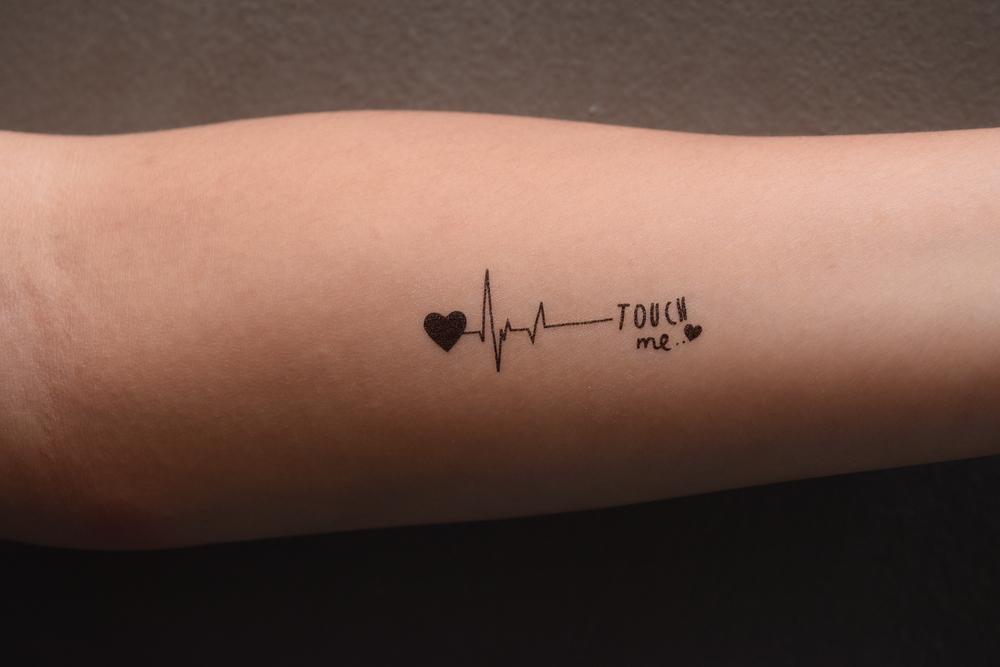 Heartbeat Tattoo Ideas for Expressive Ink Enthusiast photo.